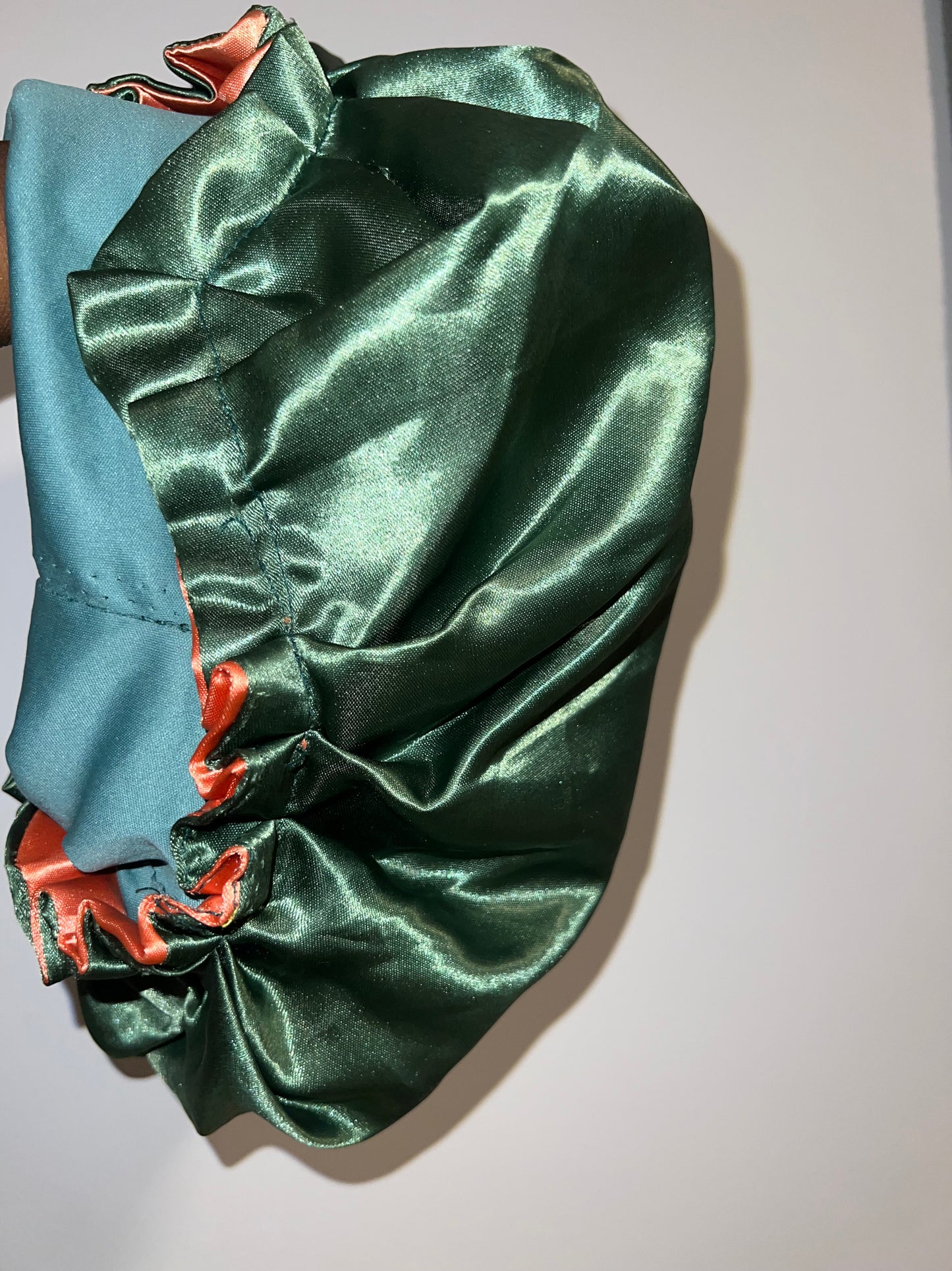 Green/peach reversible bonnet